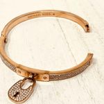 Michael Kors  rose gold tone CZ padlock bangle bracelet Photo 6