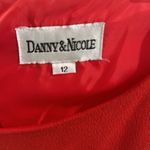 Danny & Nicole Women’s red and black size 12 formal red dress.  Photo 2