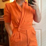 The Moon Bay +  Denim Orange Romper Photo 1