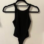 We Wore What  Danielle Bernstein Black Ribbed Tank Bodysuit Photo 2
