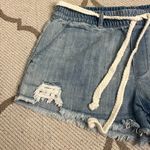 Aerie  Distressed Raw Hem Pull on Mini Light Wash Denim Shorts Size Small Photo 5