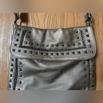 Metallic Leather Studded Cross Photo 2