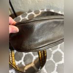 Antik Kraft Brown and Yellow Crossbody Bag with Tassel Detail and guitar strap Photo 10