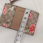 Nine West  Begonia Floral Logo Wristlet Photo 1