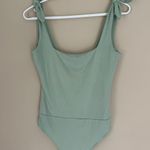 Pink Lily Thong Snap Bodysuit Photo 0