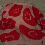 Vestique pink smile sweater Photo 1