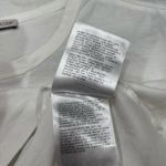  Tee Only worn once, looks and feels brand new. All tags still attached. Elevate your casual wardrobe with this Moncler white t-shirt. Photo 7