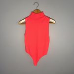 Good American Hot Coral Mock Neck Sleeveless Bodysuit | 3/4 Photo 1
