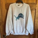 NFL Detroit Lions sweater!  Gray Sweatshirt with Blue sequins Lion Logo size XXL Photo 2