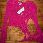 Urban Outfitters Long sleeve pink wrap top Photo 1