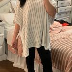 Black Rivet White And Gold Turtle Neck Poncho Sweater Photo 0