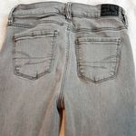 American Eagle  Next Level Stretch High Rise Light Gray Denim Distressed Jeans 0 Photo 6