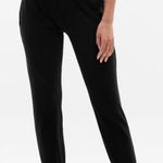 Athleta  Black Salutation 7/8 Jogger in PowerVita Sweatpants Pants Womens Size M Photo 0