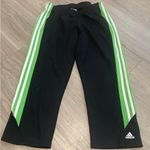 Adidas Black Cropped Pants with Green Stripes Photo 0