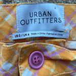 Urban Outfitters  orange gingham pants Photo 1