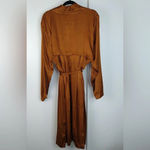 Torrid
Copper Dotted Jacquard Self Tie Trench jacket Photo 7