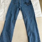 Princess Polly butterfly jeans Photo 1