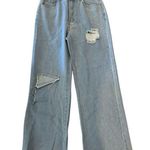 Women’s Distressed Flare Bottom Light Washed Distress Jeans Size Large Blue Photo 0