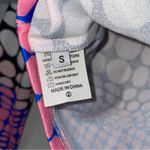 Trendingā Dynamic Polka Dotted Long Sleeve Crop Top Pink Photo 3