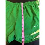 Nike Womens Dri Fit Size Small Green Yellow Running Track Shorts Photo 3