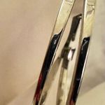 Silver tone double hoop earrings Photo 3