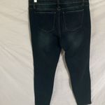 Tractr: Stretchy Skinny Jeans with red flannel covered holes Photo 8