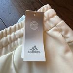 Adidas Women's Regular Fit Elastic Waist Zip Pockets Tricot Pants Off White NWT Photo 2