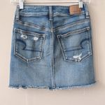 American Eagle AEO Next Level Medium Wash Distressed Ripped Jean Skirt Size 0 Photo 2