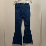 Trendy Dark Blue Flare Jeans with Ripped Knees Size M Photo 1