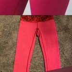 Lululemon  athletica reversible leggings in orange and  red in size 4 Photo 8