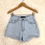 Princess Polly Lioness Rock Bottom denim shorts in blue Photo 1