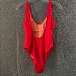 Xhilaration  Firecracker print one piece swimsuit in size m Photo 1