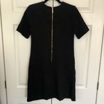 Calvin Klein Black  Dress with Gold and Silver Pockets Size US 2 Photo 3