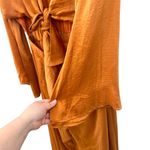 SNDYS Pluto‎ Jumpsuit in Rust Orange Long Sleeve Tie Cut Out Size US 6 Photo 7