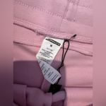 Alphalete  Women's Athletic Shorts in Soft Pink Photo 1