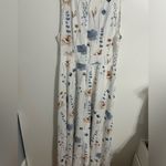 White dress with flowers. Used but in good condition. Size 14 Photo 2