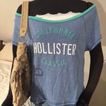 Hollister Women’s Y2K 2000s Blue Graphic Baby tee size M Photo 2