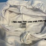 PINK - Victoria's Secret White with blue and red stripe sleeve hooded sweatshirt from PINK Photo 1