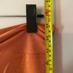 Anthropologie  Orange Rust Midi Skirt Slit Stretchy Boho Women's size Medium Photo 7