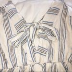 Everly  NWT medium cream ruffle bow detail romper Photo 5