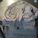 Ecru medium sized long cotton/suede cardigan with front pockets in GUC. Photo 0