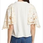 Free People NWT  White T-shirt Gold moon stars embroidered angel sleeves … Photo 1
