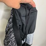 Under Armour loose fit running shorts black white gray women’s size large Photo 5