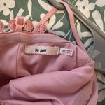 Francesca's Pink Ruffle Wrap Romper Photo 3