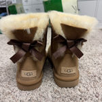 UGG  Women’s Mini Bailey Bow II Boots Chestnut Photo 0