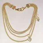 Bright Gold Tone Multi Strand Dangling Heart & Angel Charm Necklace Photo 0