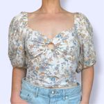 Abercrombie & Fitch floral patterned puff sleeve top with circle cut out Photo 1