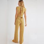 Free People vibe check tie waist jumpsuit in sunflower combo Photo 1
