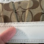 Coach Wallet Beige White Signature C Canvas Leather Tri-Fold Zip Snap Card Slots Photo 4