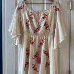 A. Calin  white flowy boho mini dress with floral details nwot Photo 0